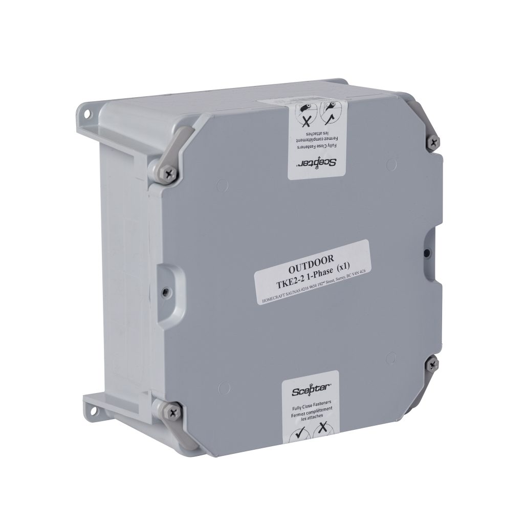 Open TKE2-2 contactor box with terminal block, contactor, red and blue wiring, and printed lid label